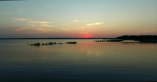 Beautiful sunset on a riverside Drone shot 4K. — Stock Video