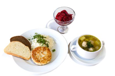 İş yemeği. Çorba, salata, göğsü ile pirinç ve ekmek izole