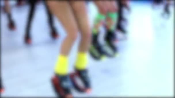 Group of young sporty caucasian women doing fitnes exercises with kangoo jumps shoes in a gym. — Stock Video