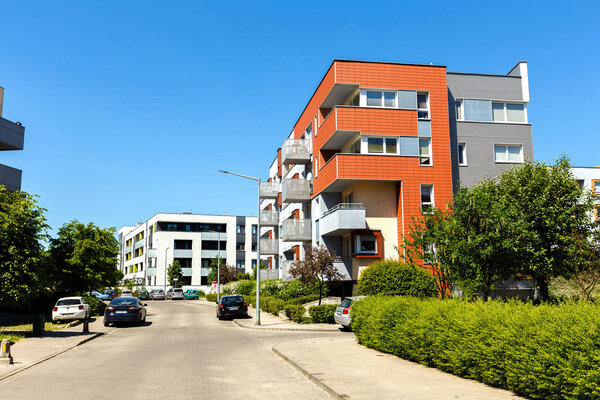 Exterior of a modern  apartment buildings on a blue sky backgrou