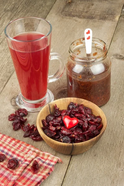 Dried cranberries in a bowl. Healthy super food. Dried cranberries on the kitchen table. Diet food.