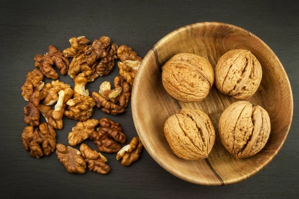 Super foods for human brain. Nuts on a wooden table. Walnuts — Stock Photo, Image