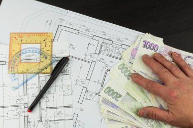 Bir ev inşa etmek için para. İpotek taksit. Geçerli çek banknotlar. Mimari Proje, mimari plan, teknik proje, inşaat planının bir parçası. 