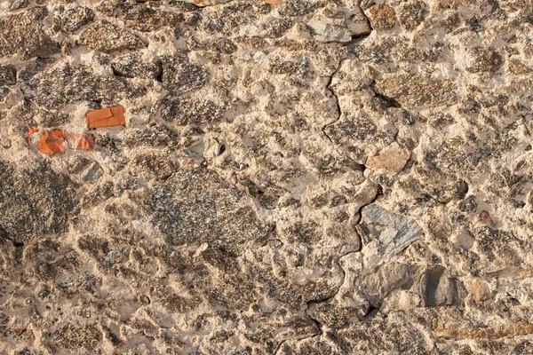 Vieux mur de granit. Fond en pierre. Mur en pierres et briques . — Photo