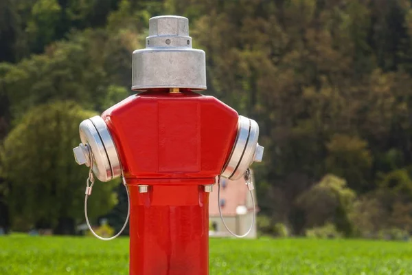 New fire hydrant on building site. Street construction. Fire safety. — Stock Photo, Image