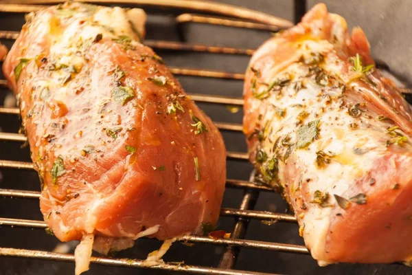 Pork tenderloin on grill. Farm raised heritage pork tenderloin on the bbq. — Stock Photo, Image