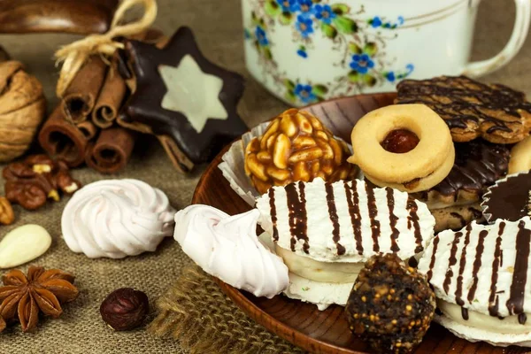 Home cookies on a dining table. Unhealthy sweet food. Dangers of obesity and diabetes.