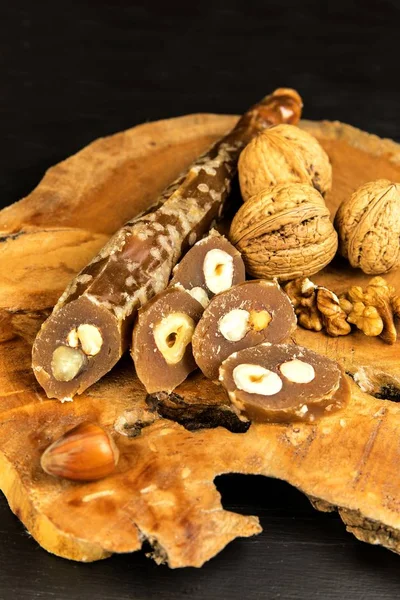 Churchkhela or Churchkela, the traditional Georgian homemade sweets with nuts. Sweet food. Traditional folk food. — Stock Photo, Image