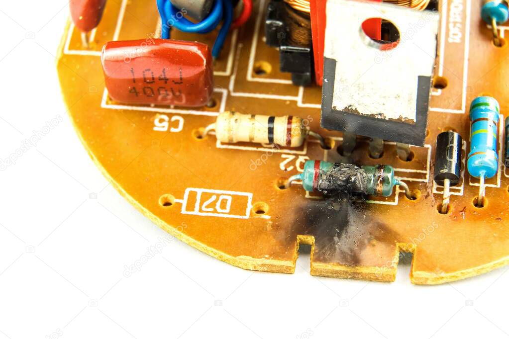 Fire in electronics. Damaged electronic component LED bulbs.  Faulty electronics. Electric resistance.