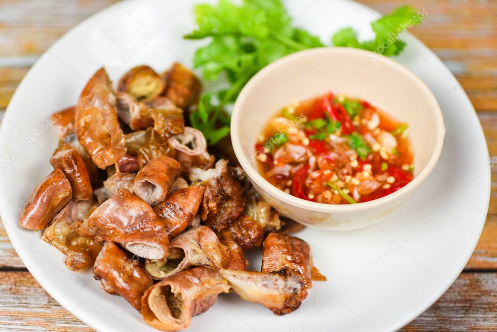Roasted pork Chitterlings with chilli sauce spicy - entrails int