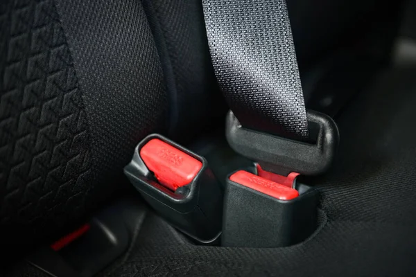 Car seat belt while sitting inside the car before driving and ta — Stock Photo, Image