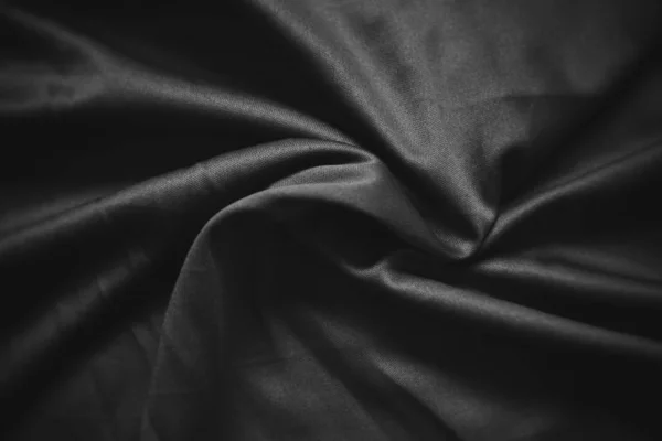 Абстрактная темно-черная смятая текстура ткани фона - Гладкая — стоковое фото