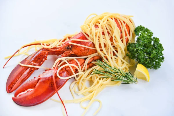 Spaghetti seafood lobster food on a white plate with herb spices — Stock Photo, Image