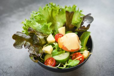 Salad vegetable with egg / salad with fruit and fresh lettuce tomato cucumber on bowl on table healthy food eating concept 