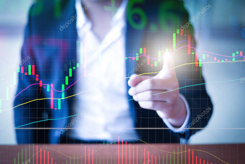 Businessman trading stocks chart with statistic analysis price table market financial data and technology / Trading stock graph or forex online with indicator on display of stock market