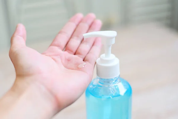 Women washing hands with alcohol gel or antibacterial soap sanitizer / People using bottle of antibacterial sanitizer soap rub clean hand gel hygiene prevention of Covid-19 Coronavirus concept