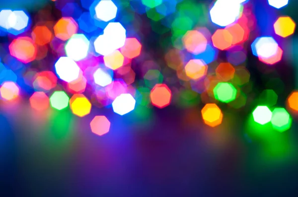 Ragyogó és ünnepi színes fény körök létre a kamera — Stock Fotó