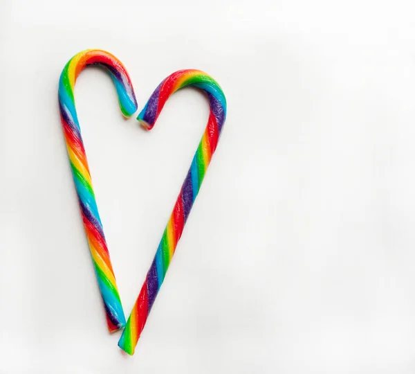 Two rainbow lollipops on white background. Candy heart. Christma — 스톡 사진