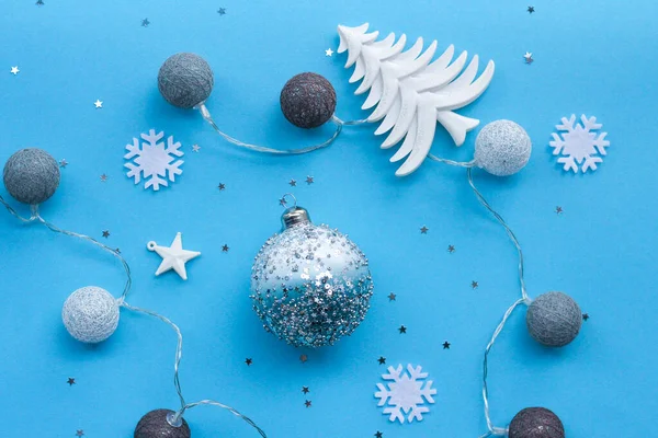 Christmas home decorations for Christmas and new year holiday on blue background — Stock Photo, Image