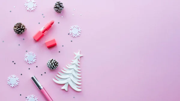 concept of Christmas mood. objects on a pink background.