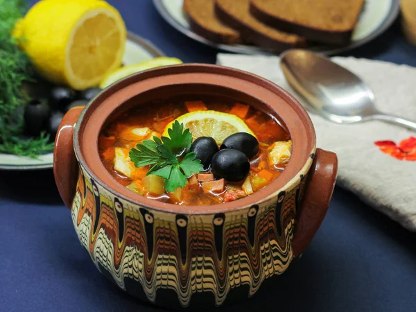 Traditional Russian soup solyanka closeup in a bowl on the table — Stock Photo, Image