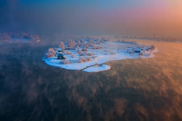 Island in the city of Irkutsk on the Angara River in winter in January.