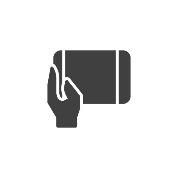 Mão segurando ícone vetor tablet — Vetor de Stock
