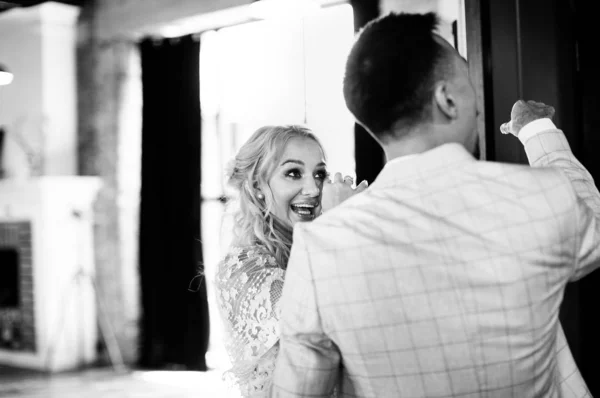 bride and groom cry with happiness on their wedding day