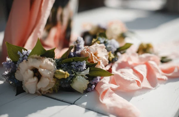 delicate wedding decor - paper leaves and real flowers