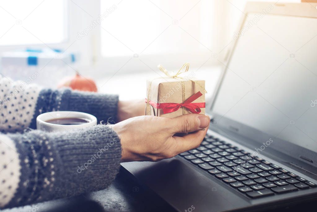 gift box and laptop, the concept of e-shopping