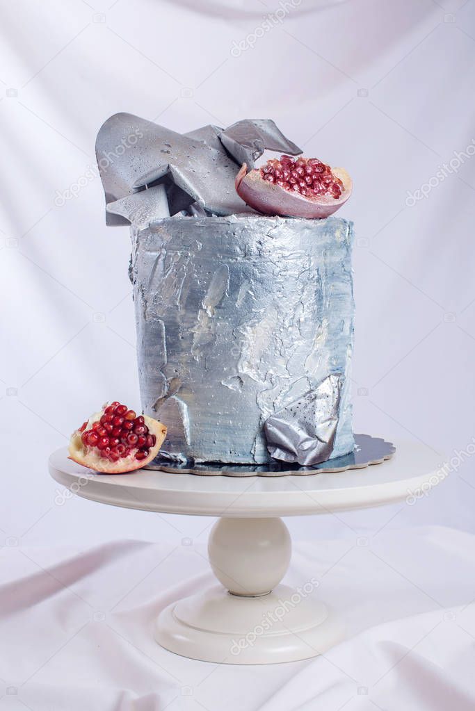 Wedding cake decorated in loft style, decorated with metal plates