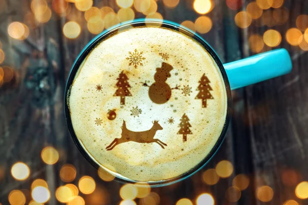 Cute winter pattern in a Cup on the milk foam cappuccino coffee. Merry Christmas — Stock Photo, Image