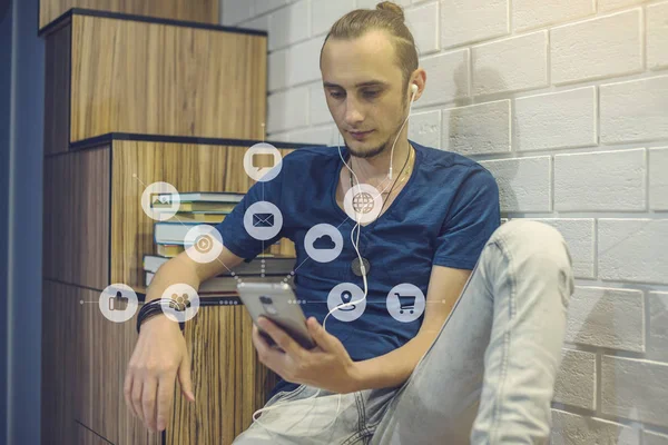 Man uses a smartphone to access social digital media in the Internet. Concept of a global network expansion — Stock Photo, Image