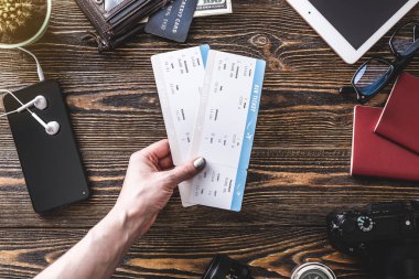 Things for the flight on holiday. Air tickets, passport, phone, credit card. Concept of easy preparation for travel