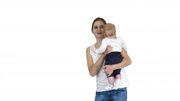 Happy mom and cute kid baby son waving hands saying hi to camera on white background. — Stock Video