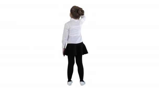 Little girl looking away on white background. — Stock Video