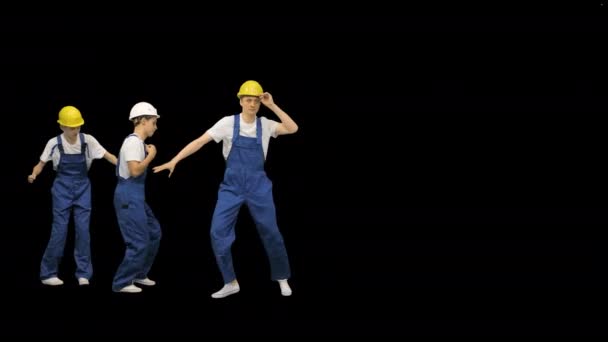 Група будівельників ходить в кадрі і танцює, Альфа-канал. — стокове відео
