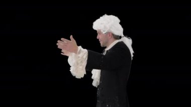 Wolfgang Amadeus Mozart gibi giyinmiş bir adam Alpha Channel 'da orkestra yönetiyor.