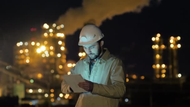 Manager Working on Tablet standing near factory. — Stock Video