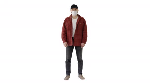 Farmer wearing medical mask looking to camera showing ok sign on white background. — Stock Video