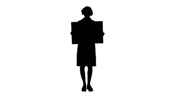 Silhouette Young woman doctor in a mask holding an empty bill bo — Stock Photo, Image