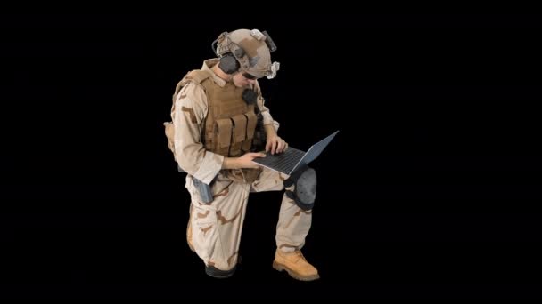 Soldier using laptop and Radio For Communication During Military Operation, Alpha Channel — Stock Video