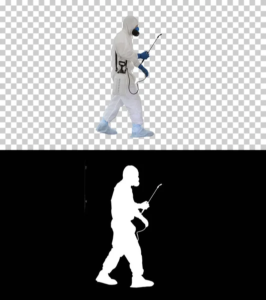 ハズマットスーツの科学者はバイオハズに対して歩くと消毒 — ストック写真