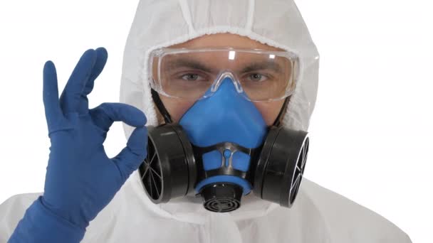 Doctor in protective clothing showing OK Everything will be OK on white background. — Stock Video