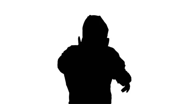 Silhouette The doctor is dancing in a protective suit against th — Stock Photo, Image