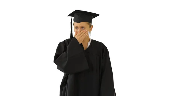 Jong afgestudeerd meisje student in mantel hoesten op wit backgrou — Stockfoto