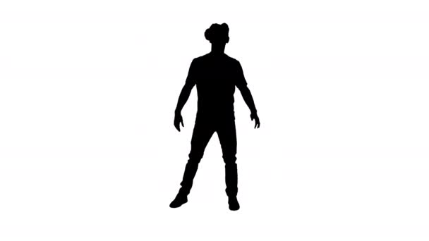 シルエットゲームで踊るVRメガネのカジュアルな男。初級レベル. — ストック動画