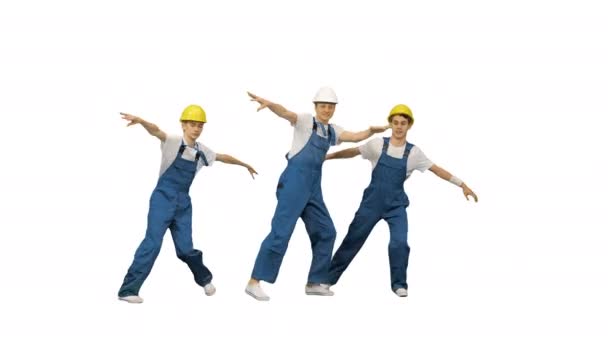 Three caucasian construction workers dancing on white background. — Stock Video