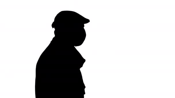 Silhouette Gentleman portant un masque protecteur marchant . — Video