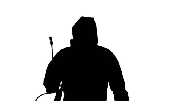 Silhouette Virologist in protective uniform walking and disinfecting the area. — Stock Photo, Image